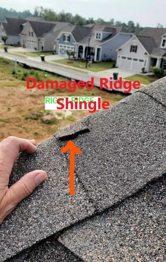 Damaged ridge shingle found during a home inspection performed by Powerworks Inspections.