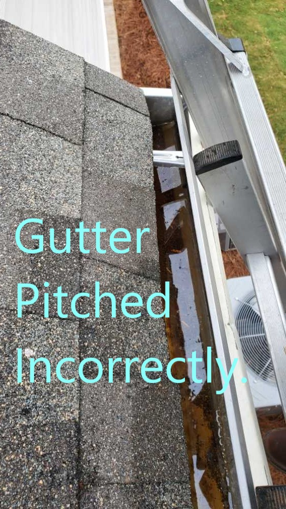 Gutter pitched incorrectly. Noted by Powerworks Inspections during a New Construction home inspection.