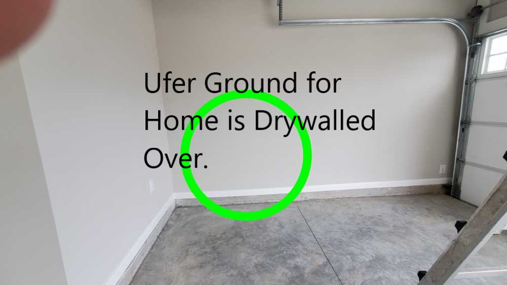 The ufer ground which is often the 2nd grounding source was not visible. The grounding conductor for the ufer ground was found in the attic going down into the exterior wall in the garage.  Noted by Powerworks Inspections during a New Construction home inspection.