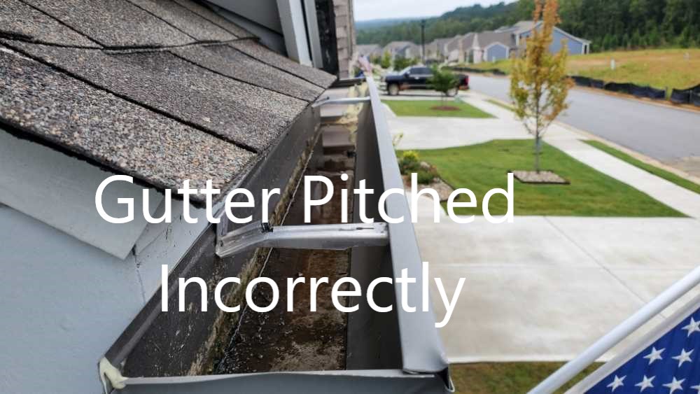 Gutter pitched incorrectly during construction. This was discovered by Powerworks Inspections during a home inspection.