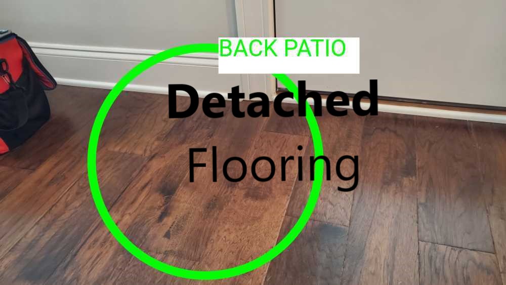 Flooring is detached from slab. Noted by Powerworks Inspections during a 11 Month warranty inspection.