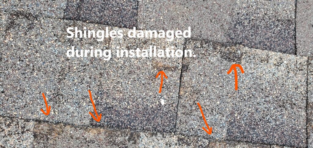 Shingles were damaged during installation and noted at the time of the 11-Month Warranty home inspection in Peachtree City Ga.. Shingle damage during installation is not an uncommon occurance. Noted by Powerworks Inspections during a 11-Month Warranty Inspection.