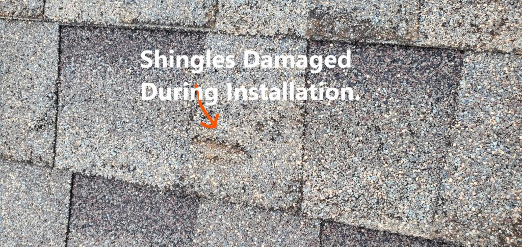 Shingles were damaged during installation and noted at the time of the 11-Month Warranty home inspection in Peachtree City Ga.. Shingle damage during installation is not an uncommon occurance. Noted by Powerworks Inspections during a 11-Month Warranty Inspection.