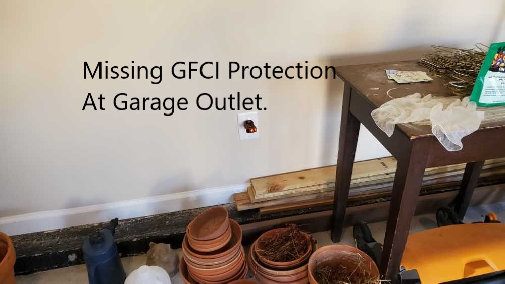 GFCI protection missed at this outlet in the garage. All other outlet were GFCI protected. Discovered by Powerworks Inspections during a Home Inspection.